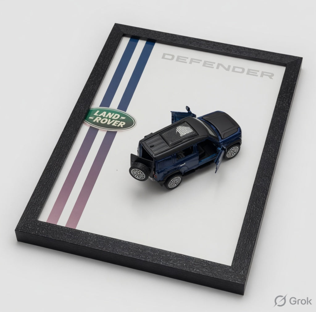 Land Rover Defender diecast model in navy blue on branded display frame