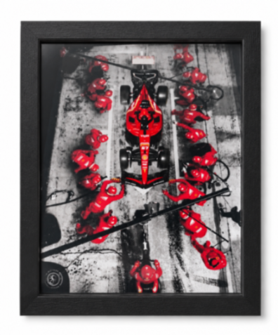 Ferrari F1 pit stop aerial view framed wall art — red crew in action on a monochrome track